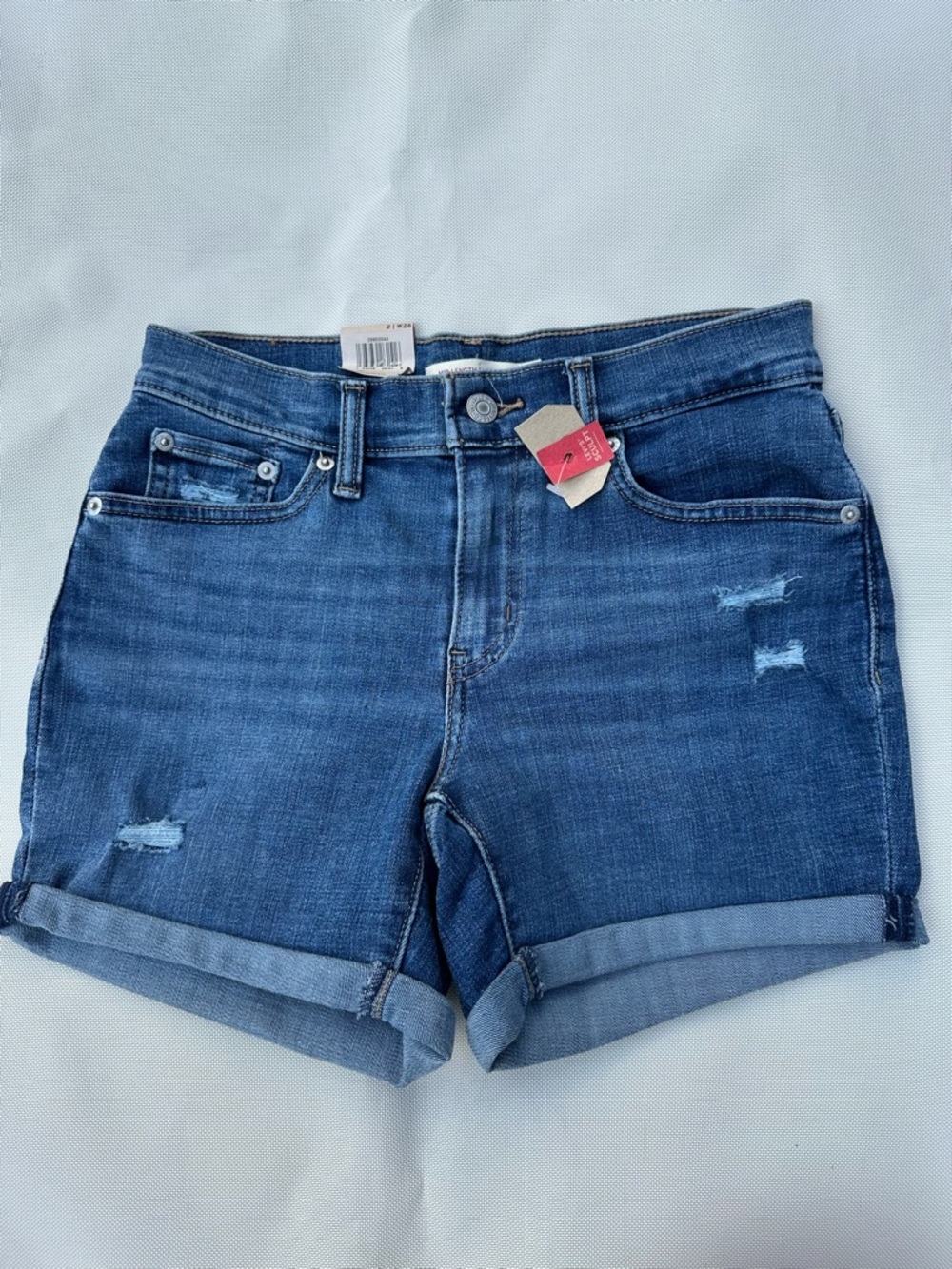 Levi's Women's Mid-Blue Rolled Hem Distressed Denim Shorts size 26